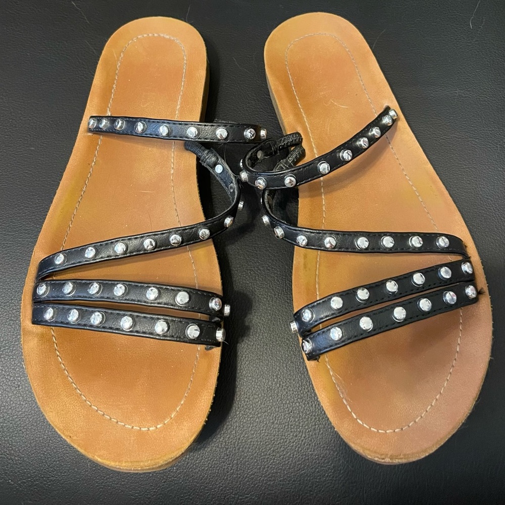 Black slip on sandals with silver studs